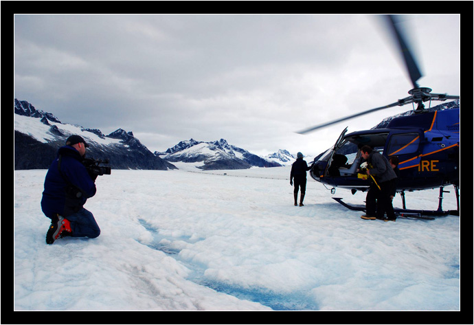 Faking the unloading of the equipment, photo by Logan Berner