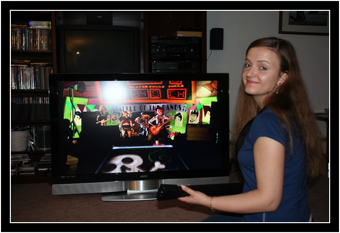 Oksana in front of the new HDTV